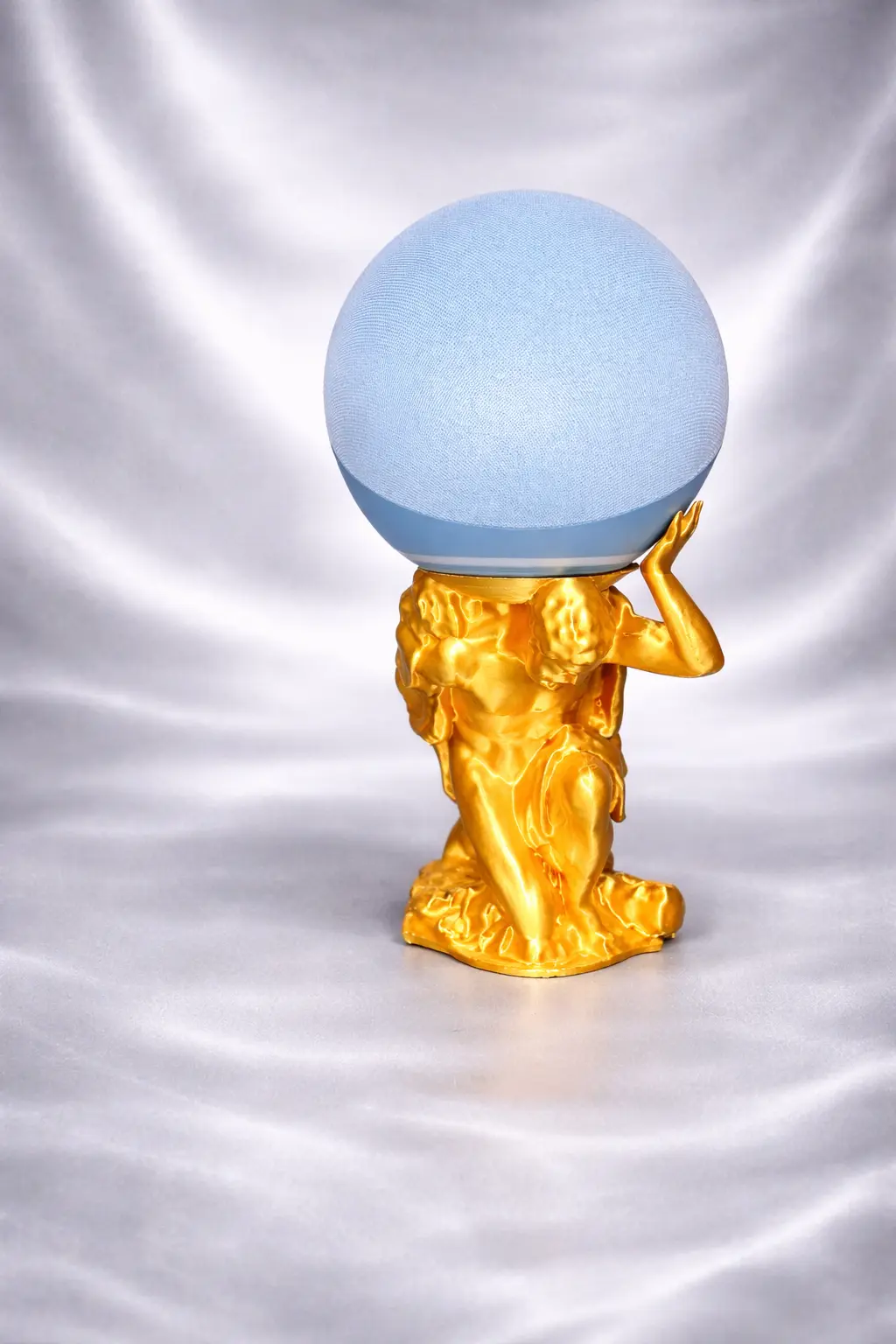 Atlas inspired globe lamp with illuminated sphere and decorative sculptural base