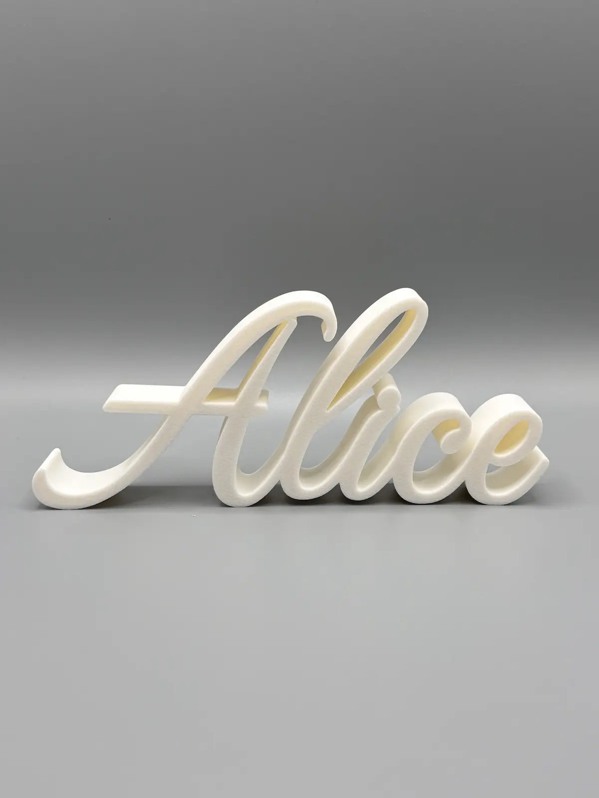 Custom 3D printed Alice name sign in white script lettering