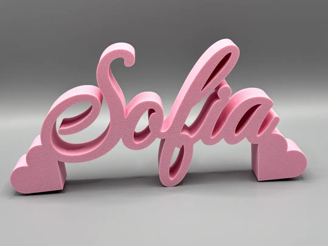 Pink custom 3D printed Sofia name sign with decorative heart accents