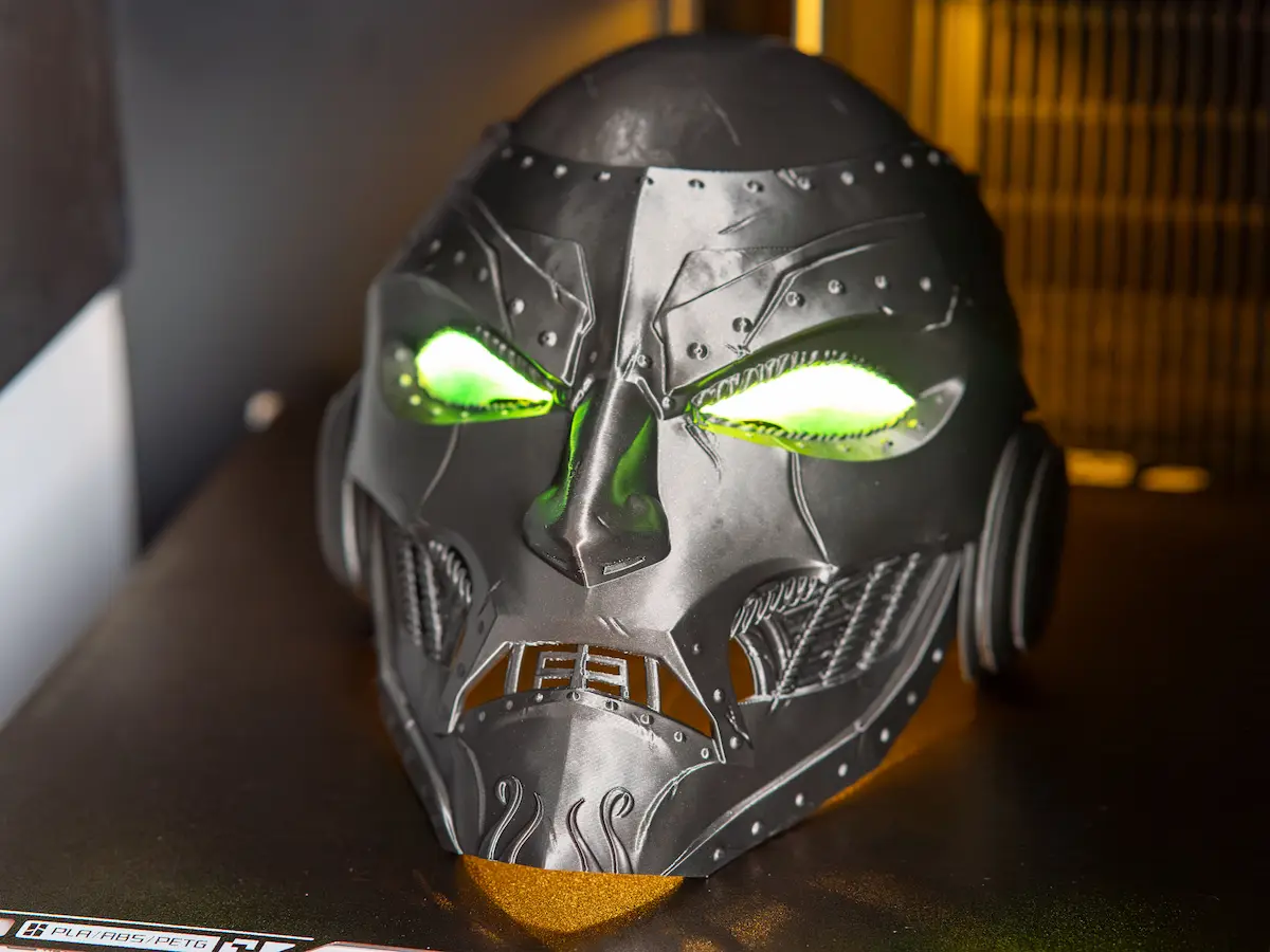 Custom 3D printed display mask with illuminated green LED eyes
