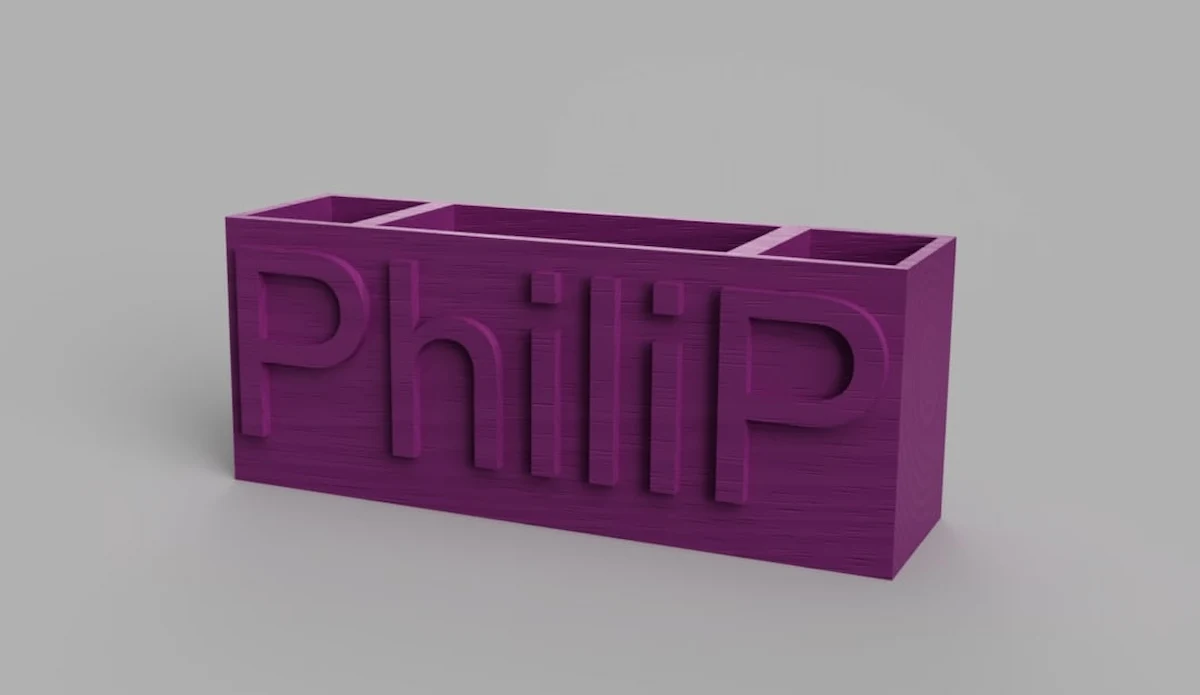 Custom 3D printed desk organizer featuring a personalized name design