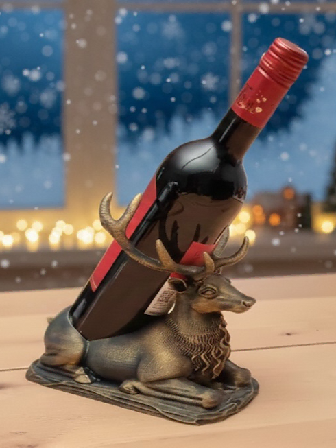 Fantasy dragon wine bottle holder displaying a wine bottle on a decorative base