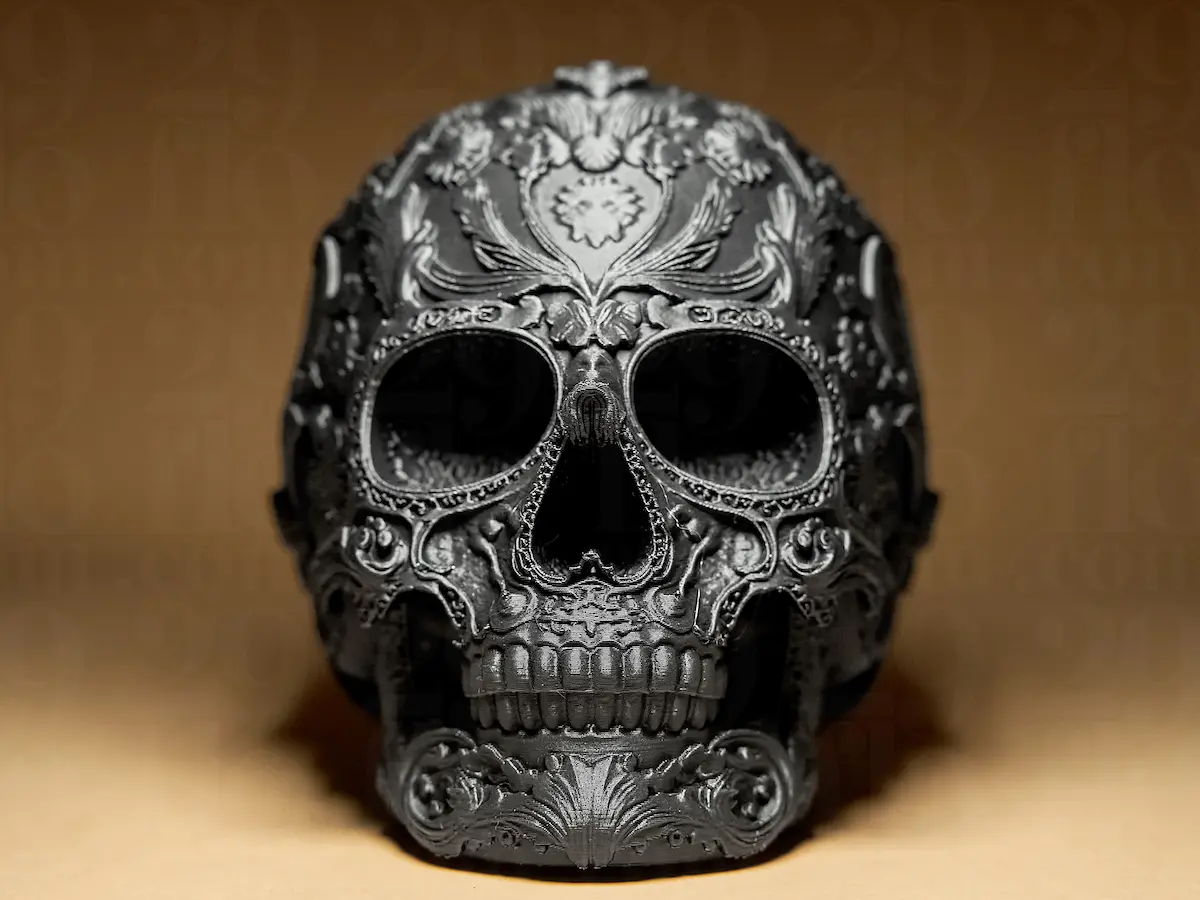 Detailed ornate 3D printed skull sculpture with engraved decorative patterns